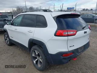 2017 Jeep Cherokee Trailhawk z VIN 1C4PJMBS4HW647835, wystawiony jako IAAI lot #41375077 z przebiegiem 87 208 mil mil oraz . Historia ofert i sprzedaży dostępna na DreamBid. Obrazek 3.