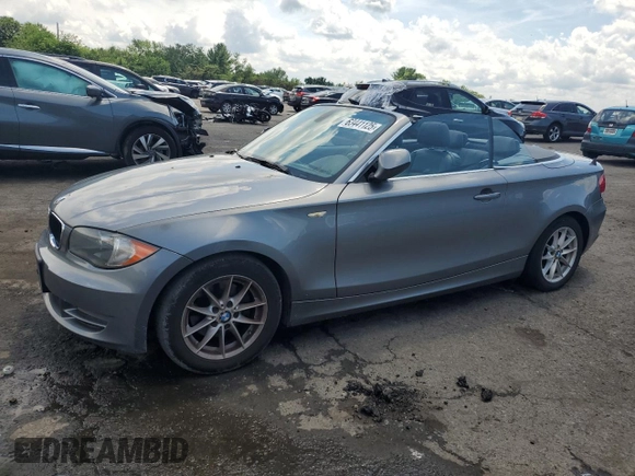 2011 BMW 1 Series 128i with VIN WBAUN1C52BVH82744, listed as a Copart auction lot 63441125 with 129,245 mi miles and Salvage title. Bid and sale history available at DreamBid. Image 1.