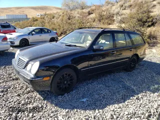 2002 Mercedes-Benz E-Class with VIN WDBJH82J42X066433, listed as a Copart auction lot 75933054 with 134,476 mi miles and Clean Title. Bid and sale history available at carsss.com. Image 1.