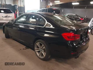 2018 BMW 3 Series 330i xDrive with VIN WBA8D9G51JNU72738, listed as a IAAI auction lot 41978561 with 71,219 mi miles. Bid and sale history available at carsss.com. Image 3.