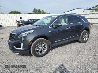 2022 Cadillac XT5 AWD Premium Luxury with VIN 1GYKNDRS9NZ126988, listed as a Copart auction lot 61019965 with 30,189 mi miles and Salvage title. Bid and sale history available at DreamBid. Image 1.