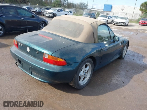 1998 BMW 3 Series 1.9L with VIN 4USCH732XWLE05993, listed as a IAAI auction lot 41551443 with 173,508 mi miles. Bid and sale history available at carsss.com. Image 4.