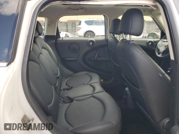 2013 MINI Countryman with VIN WMWZB3C5XDWM31715, listed as a Copart auction lot 57028565 with 95,453 mi miles and Salvage title. Bid and sale history available at DreamBid. Image 10.