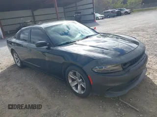 2018 Dodge Charger SXT Plus with VIN 2C3CDXHG1JH139311, listed as a IAAI auction lot 41758392 with 103,034 mi miles and . Bid and sale history available at carsss.com. Image 1.