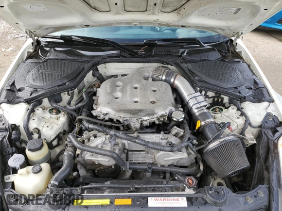 2003 Nissan 350Z Touring z VIN JN1AZ34E43T012305, wystawiony jako Copart lot #53831675 z przebiegiem 201 095 mil mil oraz Nie do naprawy • Non repairable. Historia ofert i sprzedaży dostępna na DreamBid. Obrazek 11.