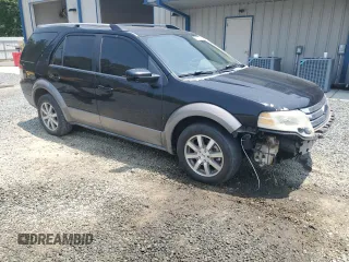 2008 Ford Taurus X SEL with VIN 1FMDK02W08GA29428, listed as a Copart auction lot 58902675 with 256,008 mi miles and Salvage title. Bid and sale history available at DreamBid. Image 4.