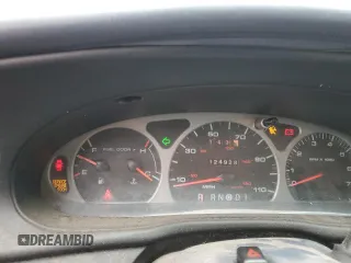 1999 Ford Taurus SE z VIN 1FAFP53U4XG150881, wystawiony jako Copart lot #40964564 z przebiegiem 124 928 mil mil oraz Tytuł czysty. Historia ofert i sprzedaży dostępna na DreamBid. Obrazek 9.
