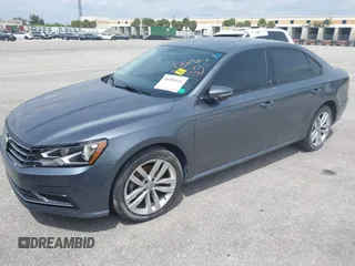 2019 Volkswagen Passat 2.0T Wolfsburg Edition with VIN 1VWLA7A35KC011084, listed as a IAAI auction lot 40385111 with 81,119 mi miles. Bid and sale history available at carsss.com. Image 17.