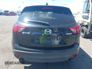 2013 Mazda CX-5 Touring with VIN JM3KE2CEXD0153589, listed as a IAAI auction lot 41855356 with 86,030 mi miles and . Bid and sale history available at DreamBid. Image 16.
