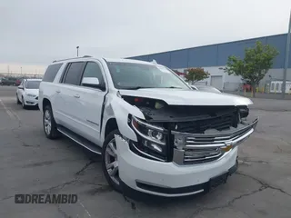 2017 Chevrolet Suburban Premier z VIN 1GNSKJKC5HR252485, wystawiony jako IAAI lot #40909630 z przebiegiem 92 490 mil mil oraz . Historia ofert i sprzedaży dostępna na DreamBid. Obrazek 1.