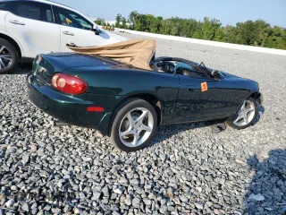 2002 Mazda MX-5 Miata Cloth with VIN JM1NB353X20231155, listed as a Copart auction lot 55805865 with Not provided miles and Salvage title. Bid and sale history available at DreamBid. Image 3.