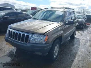 2001 Jeep Grand Cherokee Laredo with VIN 1J4GW48S21C572272, listed as a IAAI auction lot 41695754 with 169,229 mi miles. Bid and sale history available at carsss.com. Image 2.