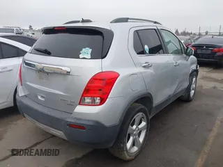2015 Chevrolet Trax LTZ with VIN 3GNCJTSB7FL235895, listed as a IAAI auction lot 41279161 with 158,877 mi miles. Bid and sale history available at carsss.com. Image 4.