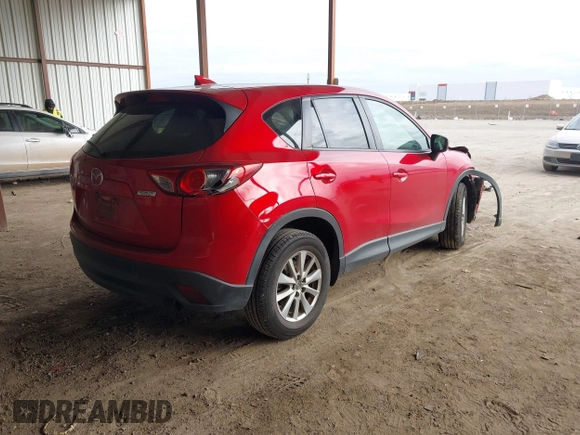 2016 Mazda CX-5 Touring with VIN JM3KE2CY0G0691927, listed as a IAAI auction lot 41611743 with 160,246 mi miles. Bid and sale history available at carsss.com. Image 4.