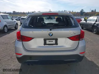 2014 BMW X1 sDrive28i with VIN WBAVM1C58EVW52847, listed as a IAAI auction lot 40779553 with 151,076 mi miles. Bid and sale history available at carsss.com. Image 16.