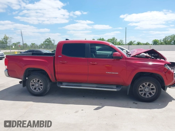 2016 Toyota Tacoma SR5 with VIN 5TFAX5GN2GX059826, listed as a IAAI auction lot 42032005 with 209,271 mi miles. Bid and sale history available at carsss.com. Image 13.