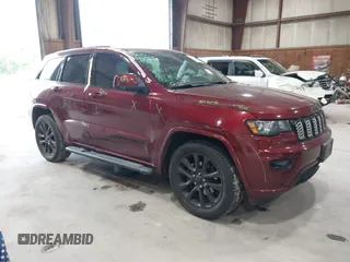 2018 Jeep Grand Cherokee Altitude with VIN 1C4RJFAGXJC394223, listed as a IAAI auction lot 42419501 with 118,863 mi miles and . Bid and sale history available at DreamBid. Image 1.