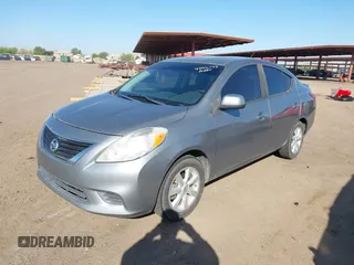 2014 Nissan Versa SV with VIN 3N1CN7AP0EL841381, listed as a IAAI auction lot 42016744 with 137,699 mi miles. Bid and sale history available at carsss.com. Image 2.