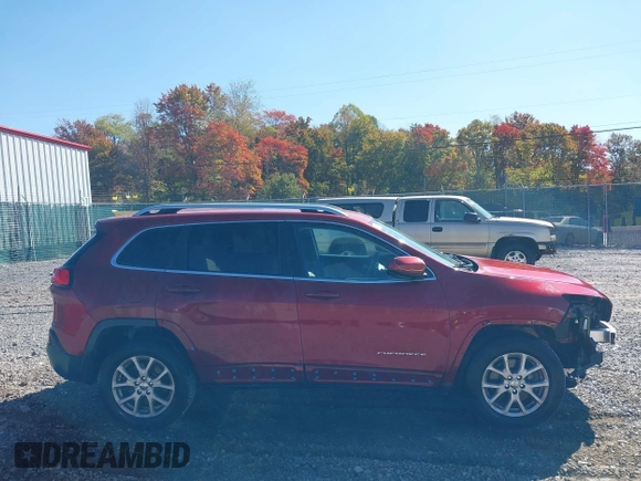 2016 Jeep Cherokee Latitude with VIN 1C4PJMCB2GW153972, listed as a IAAI auction lot 40579489 with 130,176 mi miles. Bid and sale history available at carsss.com. Image 13.