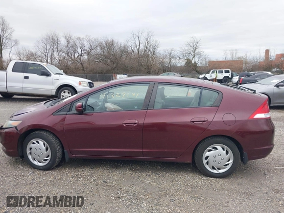 2011 Honda Insight LX z VIN JHMZE2H52BS004304, wystawiony jako IAAI lot #41827541 z przebiegiem 141 072 mil mil oraz . Historia ofert i sprzedaży dostępna na DreamBid. Obrazek 14.