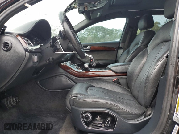 2014 Audi A8 3.0T z VIN WAURGAFD2EN002567, wystawiony jako Copart lot #48188395 z przebiegiem 159 477 mil mil oraz Szkody całkowita. Historia ofert i sprzedaży dostępna na DreamBid. Obrazek 7.