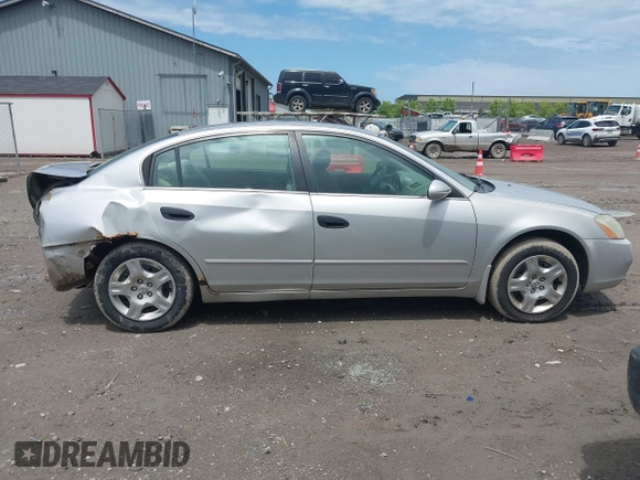 2003 Nissan Altima S z VIN 1N4AL11D63C136161, wystawiony jako IAAI lot #42461610 z przebiegiem 248 121 mil mil oraz . Historia ofert i sprzedaży dostępna na DreamBid. Obrazek 14.