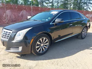 2013 Cadillac XTS Premium with VIN 2G61S5S34D9127996, listed as a IAAI auction lot 41978539 with 185,157 mi miles. Bid and sale history available at carsss.com. Image 19.