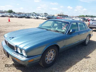 1998 Jaguar XJ with VIN SAJHX1241WC819418, listed as a IAAI auction lot 42456539 with 126,457 mi miles and . Bid and sale history available at DreamBid. Image 2.