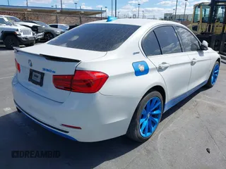 2017 BMW 3 Series 330e iPerformance with VIN WBA8E1C51HK895223, listed as a IAAI auction lot 41492625 with 116,486 mi miles. Bid and sale history available at carsss.com. Image 4.
