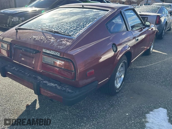 1980 Datsun 280ZX z VIN HS130198111, wystawiony jako Copart lot #84153084 z przebiegiem 106 400 mil mil oraz Tytuł czysty. Historia ofert i sprzedaży dostępna na DreamBid. Obrazek 4.