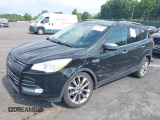 2014 Ford Escape SE with VIN 1FMCU9G94EUD84466, listed as a IAAI auction lot 42645080 with 135,535 mi miles and . Bid and sale history available at DreamBid. Image 2.