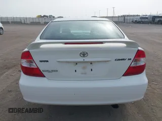 2003 Toyota Camry LE with VIN 4T1BE32K13U250477, listed as a IAAI auction lot 41996101 with 212,951 mi miles and . Bid and sale history available at DreamBid. Image 16.