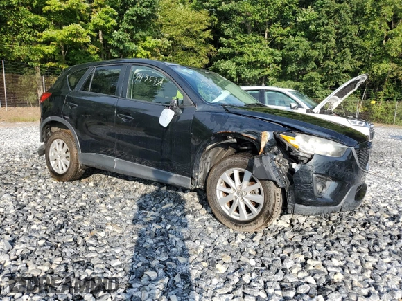 2015 Mazda CX-5 Touring with VIN JM3KE4CY4F0474732, listed as a Copart auction lot 53435334 with 134,631 mi miles and Salvage Title. Bid and sale history available at carsss.com. Image 4.