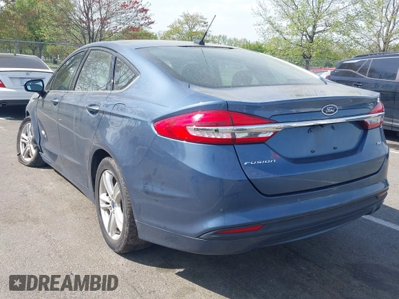 2018 Ford Fusion SE z VIN 3FA6P0H74JR176113, wystawiony jako IAAI lot #42074916 z przebiegiem 78 940 mil mil oraz . Historia ofert i sprzedaży dostępna na DreamBid. Obrazek 3.