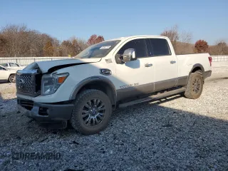2016 Nissan Titan XD Platinum Reserve with VIN 1N6BA1F47GN510930, listed as a Copart auction lot 82561154 with 146,989 mi miles and Salvage Title. Bid and sale history available at carsss.com. Image 1.
