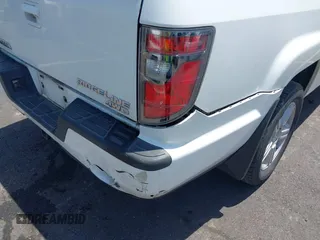 2013 Honda Ridgeline RTL with VIN 5FPYK1F50DB013612, listed as a IAAI auction lot 42430119 with 190,913 mi miles and . Bid and sale history available at DreamBid. Image 6.