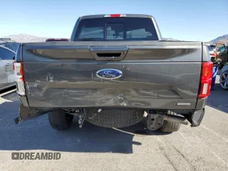 2019 Ford F-150 XL with VIN 1FTEW1E4XKKD45646, listed as a Copart auction lot 57878695 with 122,243 mi miles and Salvage title. Bid and sale history available at DreamBid. Image 6.