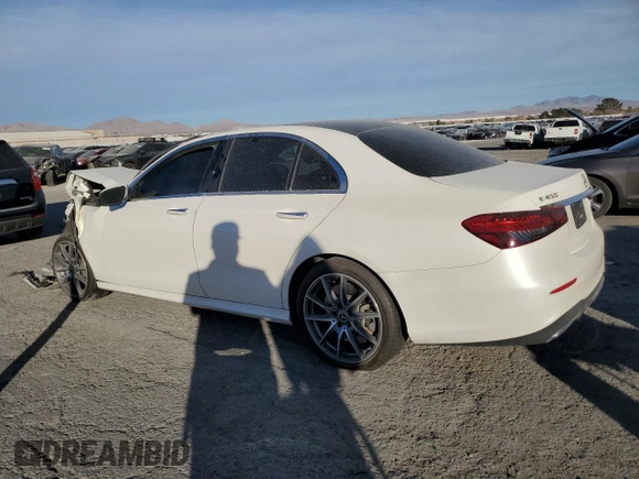 2021 Mercedes-Benz E-Class E 450 with VIN W1KZF5KB7MA935054, listed as a Copart auction lot 86288904 with 30,275 mi miles and Salvage Title. Bid and sale history available at carsss.com. Image 2.