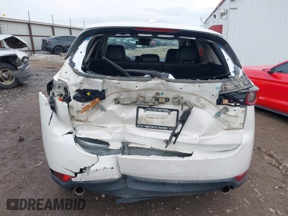 2020 Mazda CX-5 Touring with VIN JM3KFBCM6L0764982, listed as a IAAI auction lot 41632293 with 96,042 mi miles. Bid and sale history available at carsss.com. Image 17.