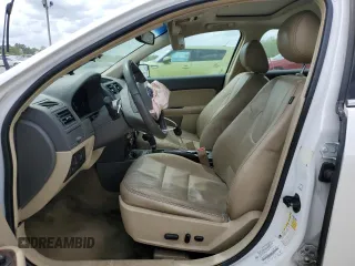 2012 Ford Fusion SEL z VIN 3FAHP0JA3CR184074, wystawiony jako Copart lot #51973675 z przebiegiem 192 732 mil mil oraz Szkoda całkowita • Salvage title. Historia ofert i sprzedaży dostępna na DreamBid. Obrazek 7.