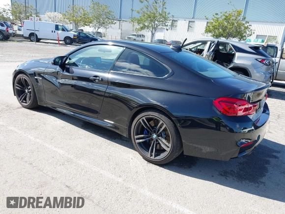 2015 BMW M4 with VIN WBS3R9C58FK334247, listed as a IAAI auction lot 41940211 with 125,881 mi miles. Bid and sale history available at carsss.com. Image 3.