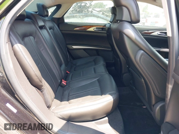 2013 Lincoln MKZ z VIN 3LN6L2G95DR822487, wystawiony jako IAAI lot #42347635 z przebiegiem 81 596 mil mil oraz . Historia ofert i sprzedaży dostępna na DreamBid. Obrazek 8.