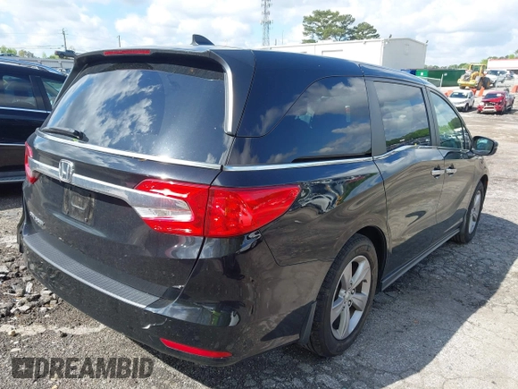 2018 Honda Odyssey EX-L with VIN 5FNRL6H75JB065206, listed as a IAAI auction lot 42009227 with 133,652 mi miles. Bid and sale history available at carsss.com. Image 4.