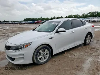 2017 Kia Optima LX z VIN 5XXGT4L33HG158264, wystawiony jako Copart lot #61126715 z przebiegiem 164 704 mil mil oraz Czysty tytuł • Clean title. Historia ofert i sprzedaży dostępna na DreamBid. Obrazek 1.