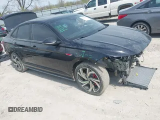 2023 Volkswagen Jetta GLI Autobahn z VIN 3VW2T7BU2PM054137, wystawiony jako IAAI lot #42029063 z przebiegiem 17 456 mil mil oraz . Historia ofert i sprzedaży dostępna na DreamBid. Obrazek 1.