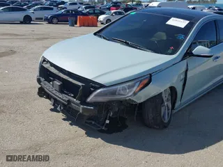 2016 Hyundai Sonata Hybrid Limited with VIN KMHE34L16GA009777, listed as a IAAI auction lot 41852137 with 79,589 mi miles. Bid and sale history available at carsss.com. Image 6.