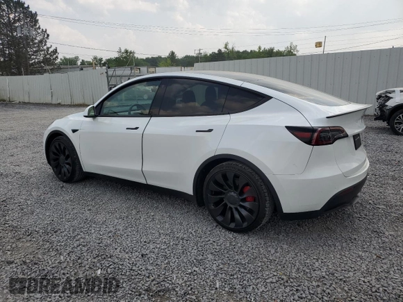 2022 Tesla Model Y Performance with VIN 7SAYGDEF1NF445085, listed as a Copart auction lot 58809495 with 14,832 mi miles and Salvage title. Bid and sale history available at DreamBid. Image 2.