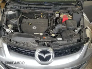 2011 Mazda CX-7 i Sport z VIN JM3ER2B50B0394884, wystawiony jako Copart lot #54360525 z przebiegiem 202 657 mil mil oraz Szkody całkowita. Historia ofert i sprzedaży dostępna na DreamBid. Obrazek 12.