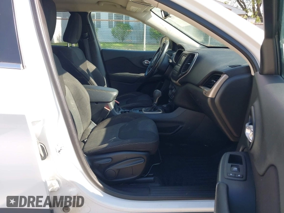 2015 Jeep Cherokee Latitude with VIN 1C4PJMCS0FW790017, listed as a IAAI auction lot 42097988 with 105,990 mi miles and . Bid and sale history available at DreamBid. Image 5.