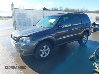 2006 Mazda Tribute LX with VIN 4F2YZ94166KM15756, listed as a IAAI auction lot 41448862 with 101,862 mi miles and . Bid and sale history available at DreamBid. Image 2.